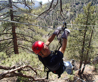 Ando on a zip line.